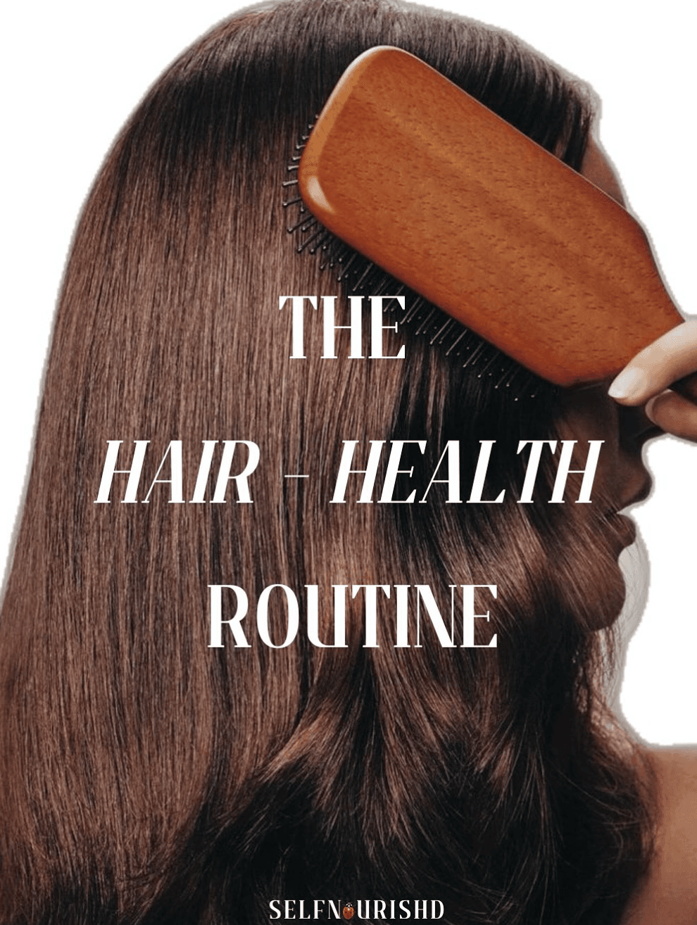 A woman brushing long dark hair with a wooden paddle brush